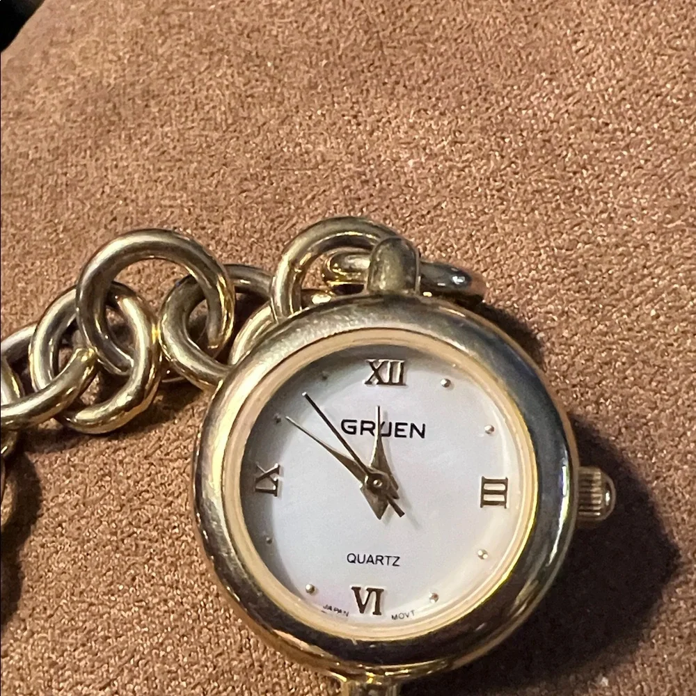 Gold-Tone Charm Bracelet Watch with Heart Locket
